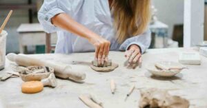 an artist doing pottery, representing the creative outlets that bring fulfillment beyond the clinic.