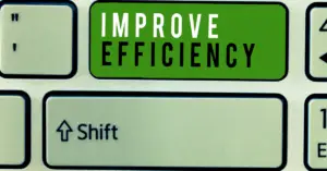 Human vs AI in medical virtual assistance comparison showing real clinic workflow with both human staff and AI tools supporting operations